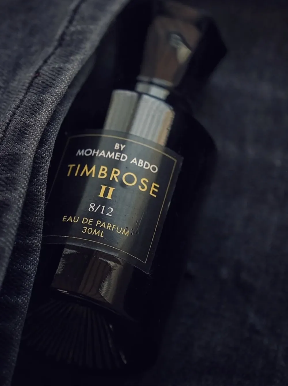 A close view of the Timbrose II label, numbered 8 of 12, in low light